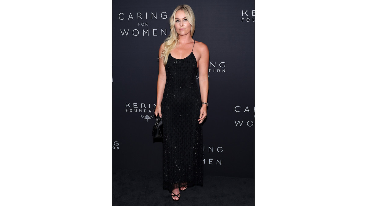 Lindsey Vonn poses in a shimmery black gown.